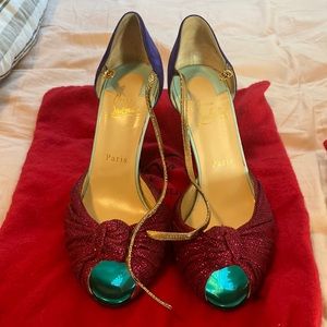 Christian Louboutin (red bottom) heels